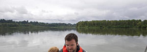 Marlow Bullis, 6, rests on the shoulder of her dad, Vancouver Rowing Club coach Co<em></em>nor Bullis, while on a boat tour.