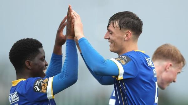 Waterford's Samuel Perry, right, is co<em></em>ngratulated by team-mate Serge Atakayi after scoring his side's second goal